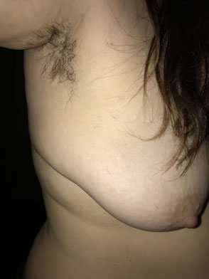 Titsy MILF with hairy armpits.