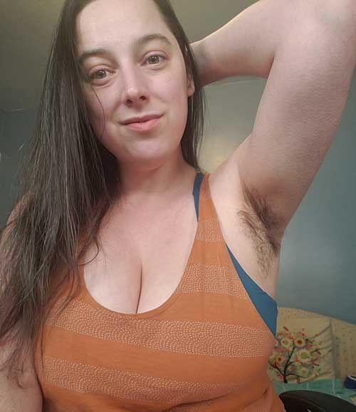 Titsy MILF with very unshaven armpits.